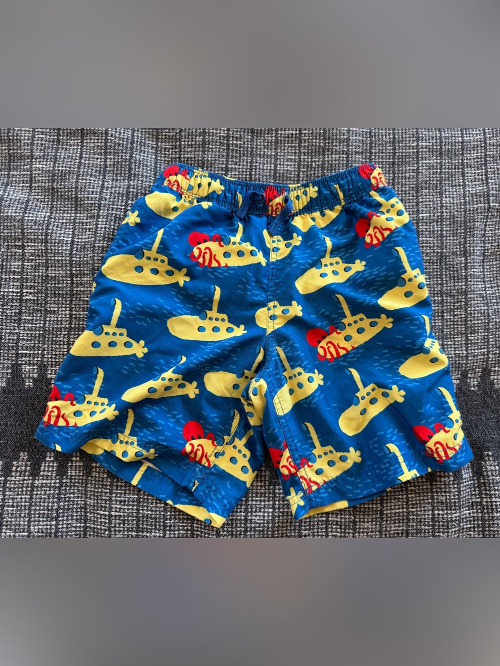 Hanna Andersson Blue Swim Shorts with Yellow Submarine Print and Red Accents